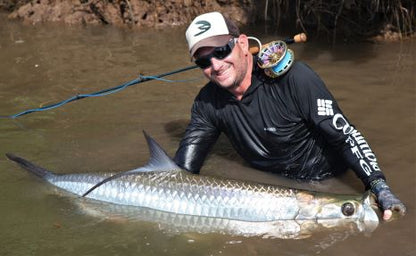 Orinoco Flies founder with a jungle tarpon caught on a Mullet fly